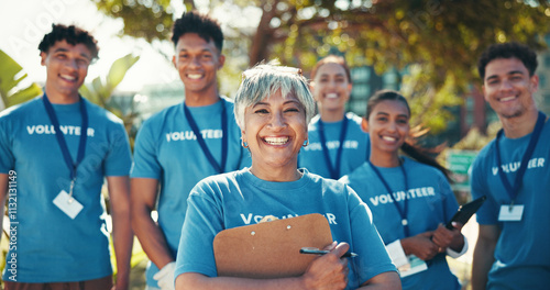 Charity, leadership and portrait of volunteer team outdoor in park for community food drive or donation. Activism, clipboard and smile with group of people as welfare workers for NGO or non profit