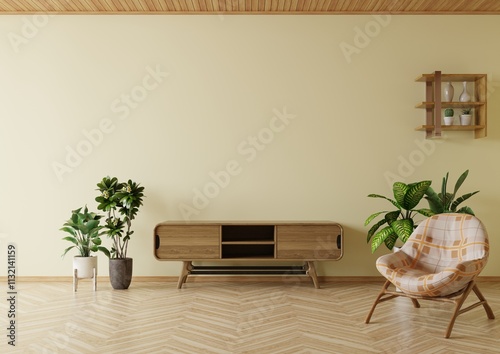 Living room has cream colored walls and a TV table decorated with potted plants.