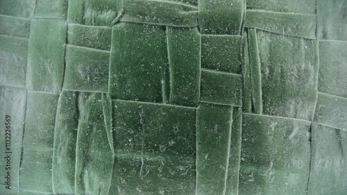 texture of green artificial burlap, shot under microscope,Dolly shot.