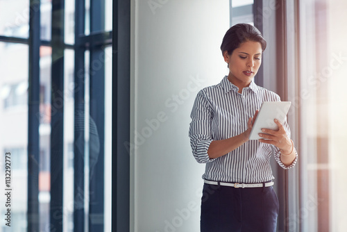 Obraz na plátně Business, woman and serious at office with tablet for drafting announcement and email marketing as hr manager