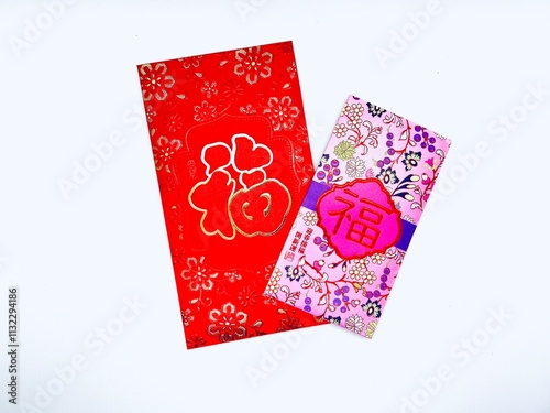 A vibrant red envelope or angpao or angpau or red packet used for gifting money during celebrations with gold floral patterns and a Chinese character for good fortune or prosperity