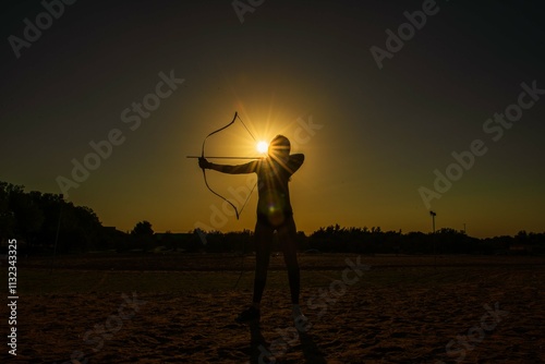 silhouette of a person in the sunset