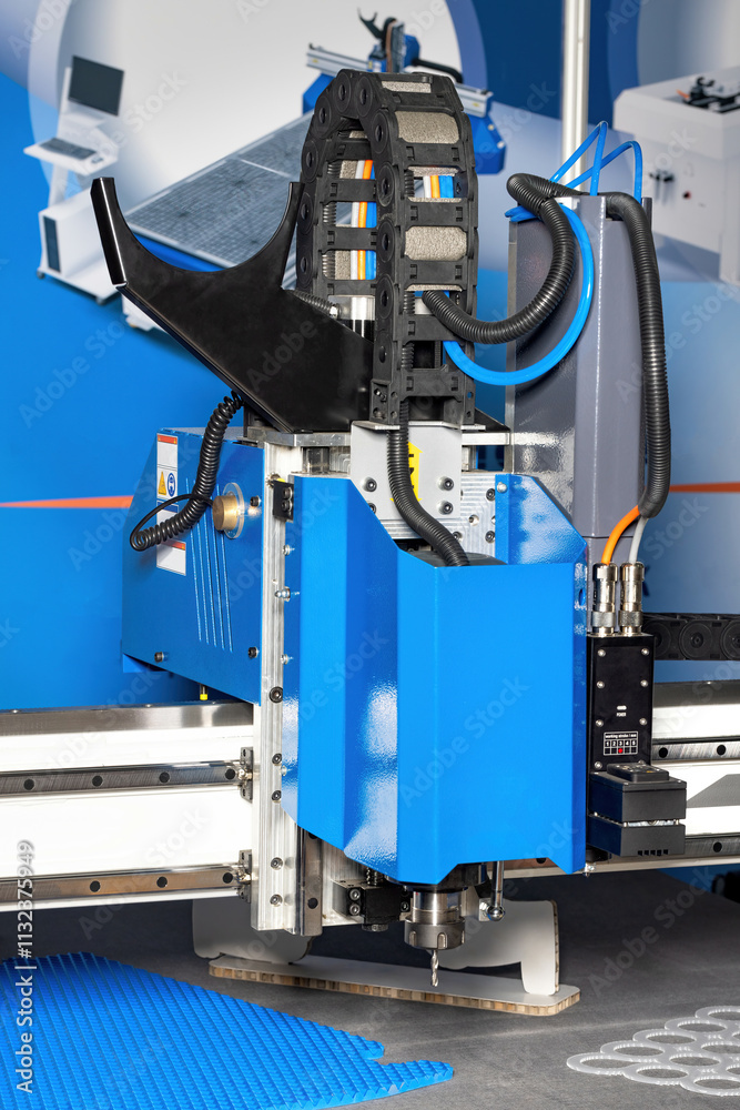 Advanced cutting machine at work in a modern manufacturing facility