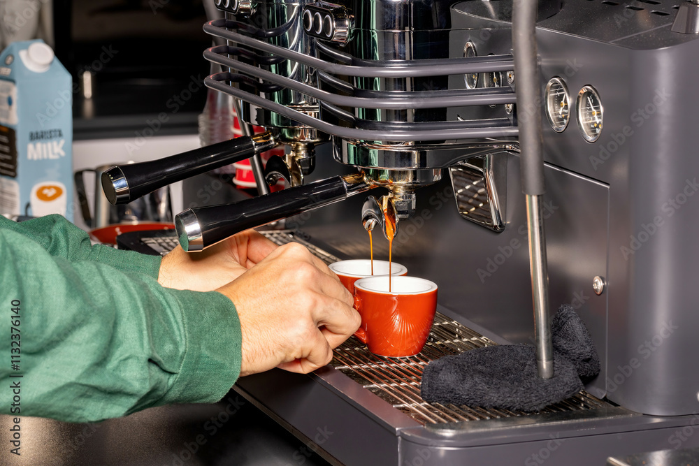 Crafting the perfect espresso at a vibrant coffee station in the early morning hours