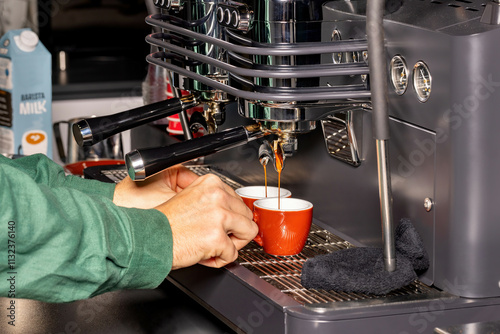 Obraz na płótnie Crafting the perfect espresso at a vibrant coffee station in the early morning hours w salonie