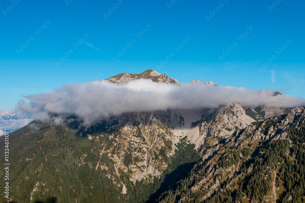 Φωτογραφία Scenic view of cloud covered mountain peak Wertatscha seen from Begunjscica, Loibl Pass in Karawanks, Slovenia Austria