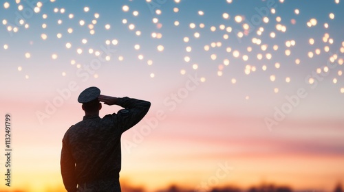 Soldier Silhouette Saluting at Sunset with Festive Lights