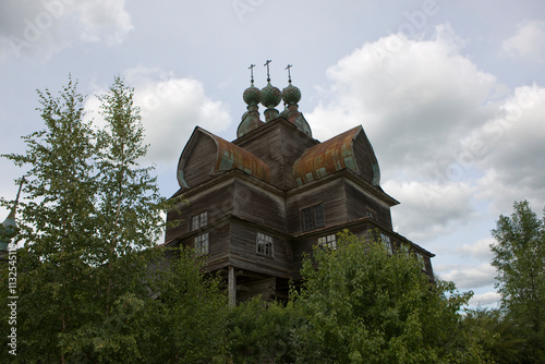 Russia Vologda region Cherepovets district Church of the Assumption of the Virgin Mary view on a cloudy summer day photo