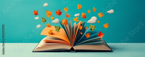 An open book with colorful leaves and clouds floating out, symbolizing creativity and imagination.