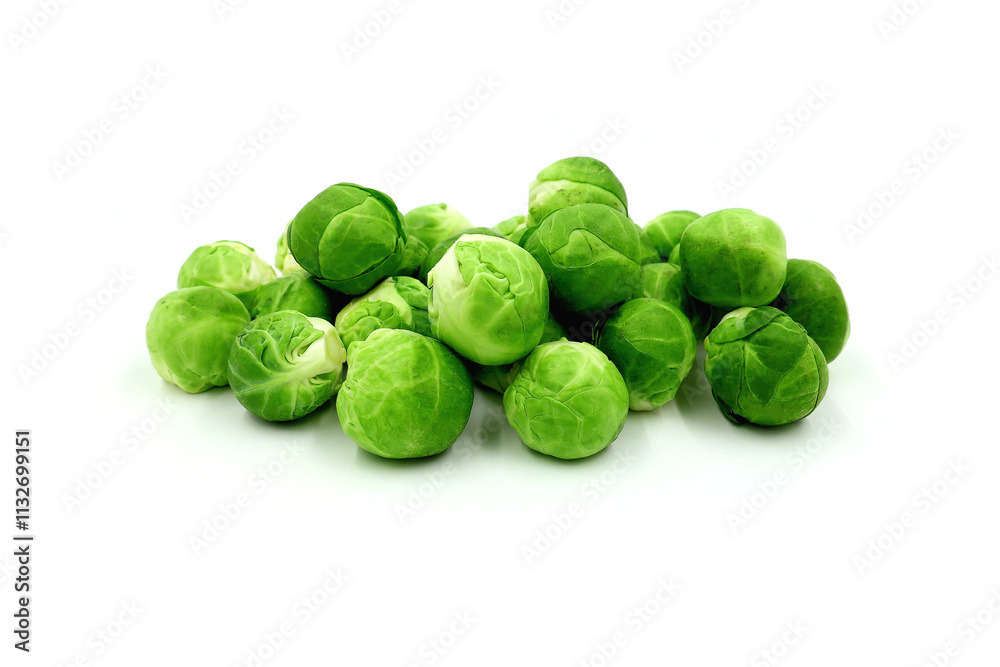 Fototapeta premium Fresh Brussels sprouts isolated on white background. Brussels sprouts are a typical winter vegetable.