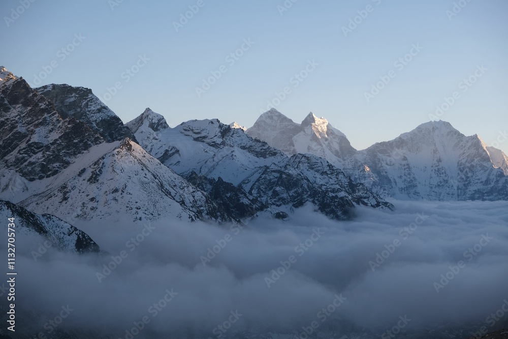 Obraz premium Amazing himalayas panorama with peaks above clouds from Kala Patthar viewpoint. Everest Base Camp, Sagarmatha National Park, Khumbu valley, Nepal, Himalayas