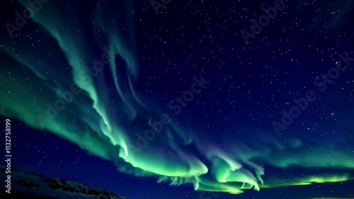 Aurora borealis lighting up the night sky with vivid green and purple shades dances gracefully over a snowy mountain landscape, creating a stunning natural display, loop