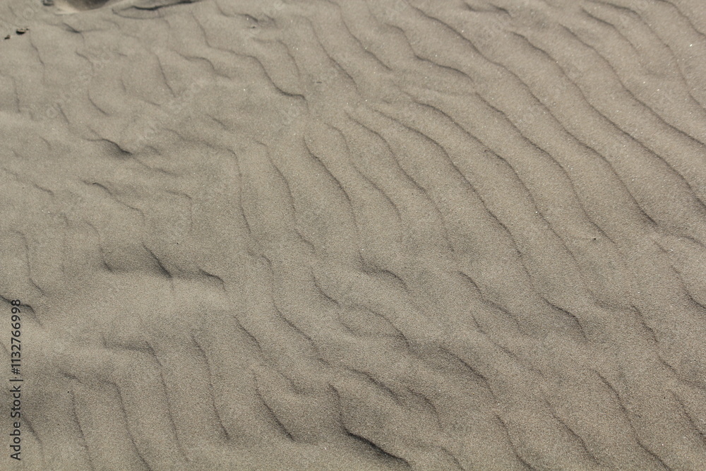 Fototapeta premium Image of Busan Dadaepo Beach sand transformed into beautiful shapes by the wind 
