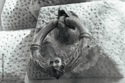 Decoration ring on the wall of Palacio de Carlos V in La Alhambra, Granada, Spain.