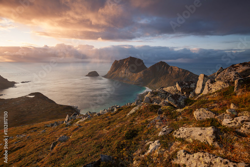 View of Haukland Beach from the top of Holandsmelen, Lofoten. Dramatic sunset in autumn. photo