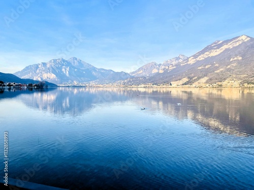 Haze on mountain lake  in sunset  light
