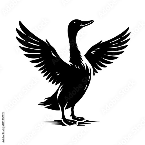 Black silhouette of a goose with wings spread. photo