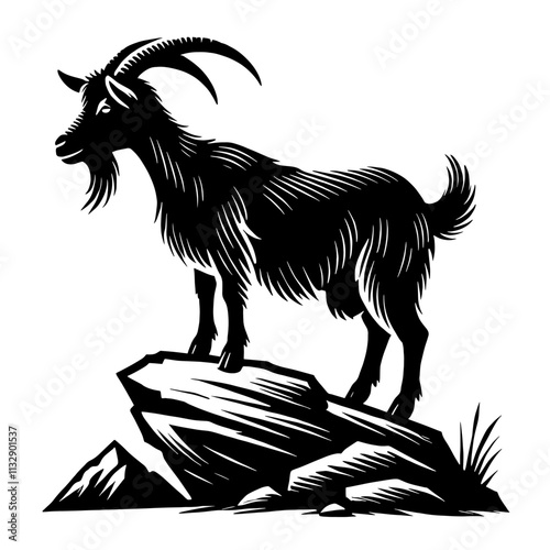 Majestic goat standing on a rock.