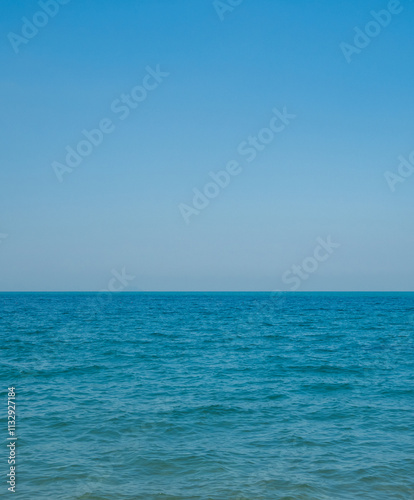 Horizon photogrphy beautiful landscape summer season vertical view tropical sea beach white sand clean blue sky background calm nature ocean wave water travel holiday at samae san island sun day time. photo