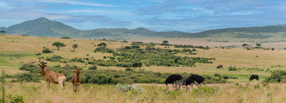 African savanna with antelopes, ostriches, and grazing animals set against rolling hills of Masai Mara