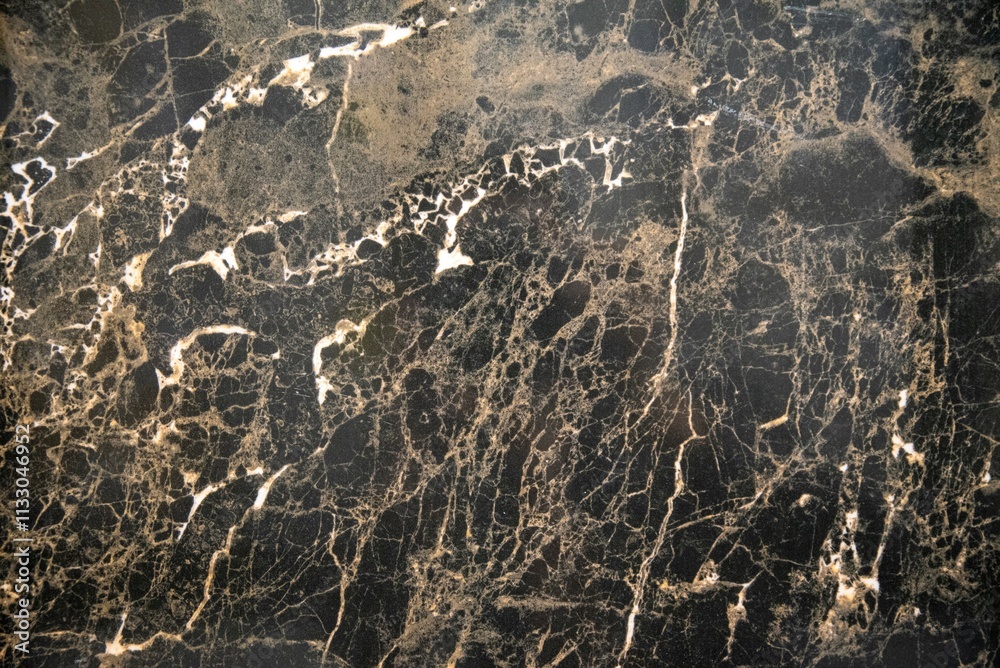 Fototapeta premium Dark beautiful marble texture showcasing brown veining and color contrasts