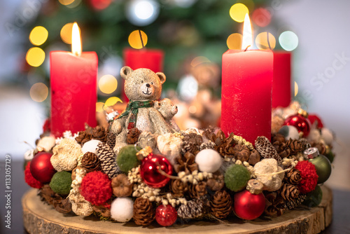 Christmas advent wreath decoration with candles and bears