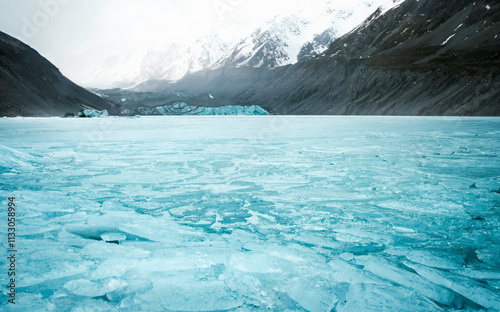 Frozen Hooker Lake ice with Hooker Glacier terminus in background -  Canterbury, New Zealand South Island near Mount Cook Aoraki - valley track hike, Landscape photography