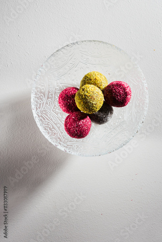 Candies energy balls in coconut flakes.