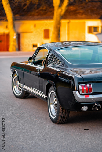 Classic Black Sports Car Highlighting Stylish Design and Rear Details