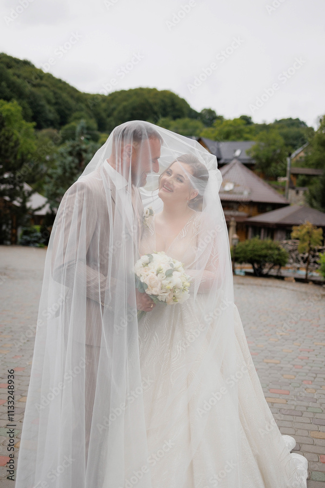 A group of musicians are playing in a garden setting. The chairs are arranged in a semi-circle around the musicians
