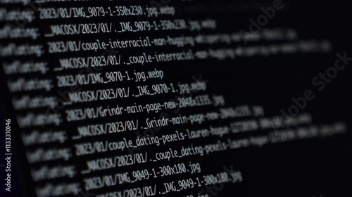 lines of code moving rapidly on a dark screen with a zoom effect, creating a dynamic and immersive programming visualization
