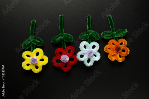 Beautiful Colorful Handmade Pipe Cleaner Flower Craft Mirror, Sunflower Craft Keychain, dark on black background