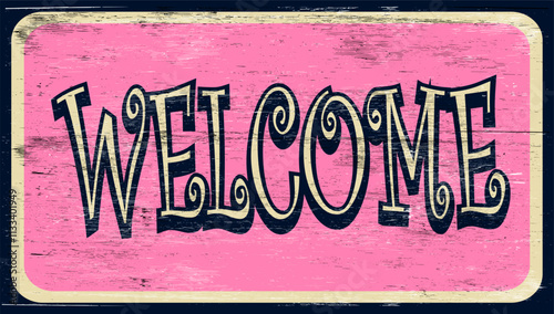 Aged retro welcome sign on wood