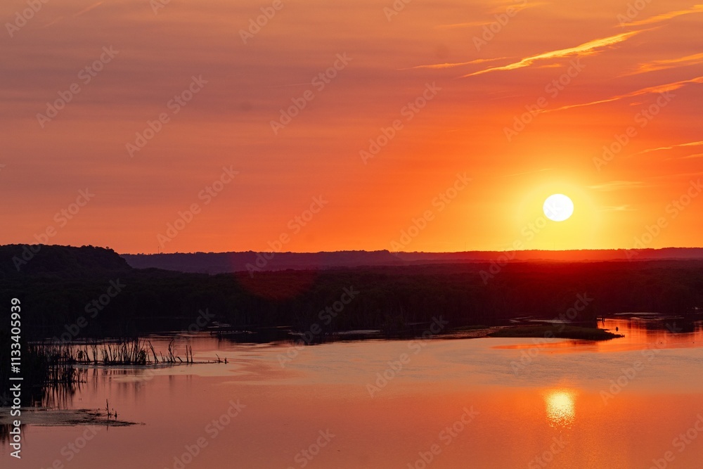 Obraz premium sunset over the river