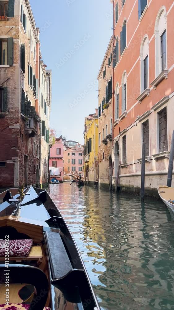 Experience the Serene and Beautiful Canal View in Venice, Surrounded by Colorful Buildings