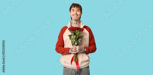 Handsome young tattooed man...
