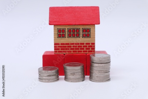 house and satck of coins photo