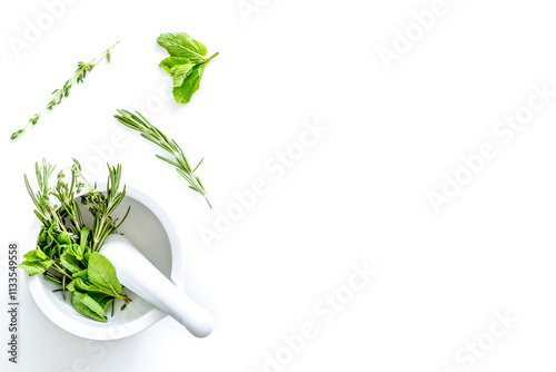 Homeopathy with leaves and healing herbs for making oil on white