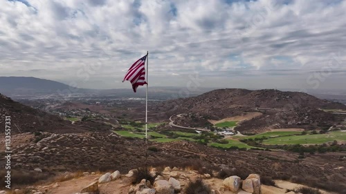 american flag on hill 360 orbit drone