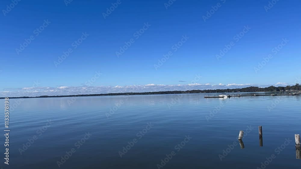 Golden Light Over a Calm Lake | Nature Stock Footage Golden Light Over a Calm Lake | Nature Stock Footage