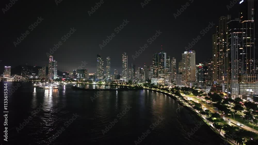 Aerial drone view of Panama City at night.