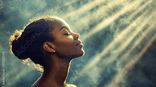 African American woman engaged in prayer, embodying faith and devotion.