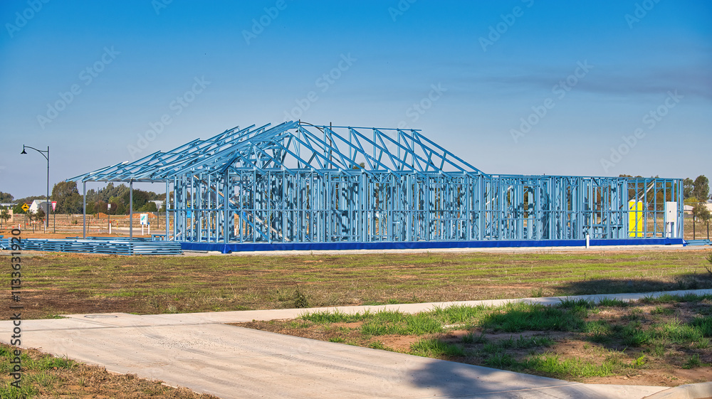 Blue metal framework of a new residential home Blue metal framework of a new residential home