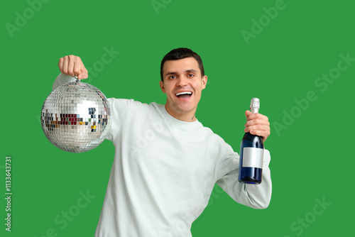 Happy young man with disco ...