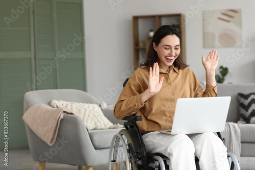 Young woman in wheelchair w...