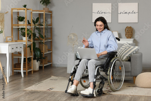 Young woman in wheelchair w...