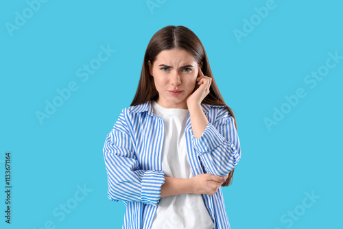 Young woman feeling pain in...