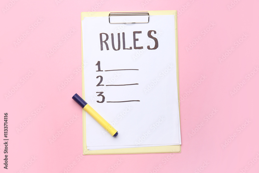 Clipboard with blank list of rules on pink background Clipboard with blank list of rules on pink background