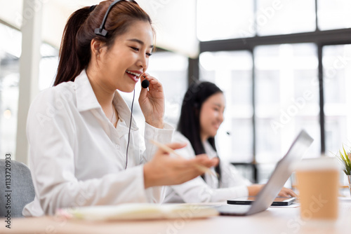 Asian call center team, customer service, telesales wearing headset or headphone talking with customer in the office. Customer Service Representative, Service, Call Center, 
