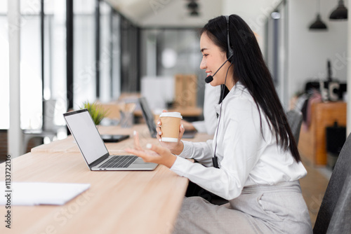 Asian call center team, customer service, telesales wearing headset or headphone talking with customer in the office. Customer Service Representative, Service, Call Center, 